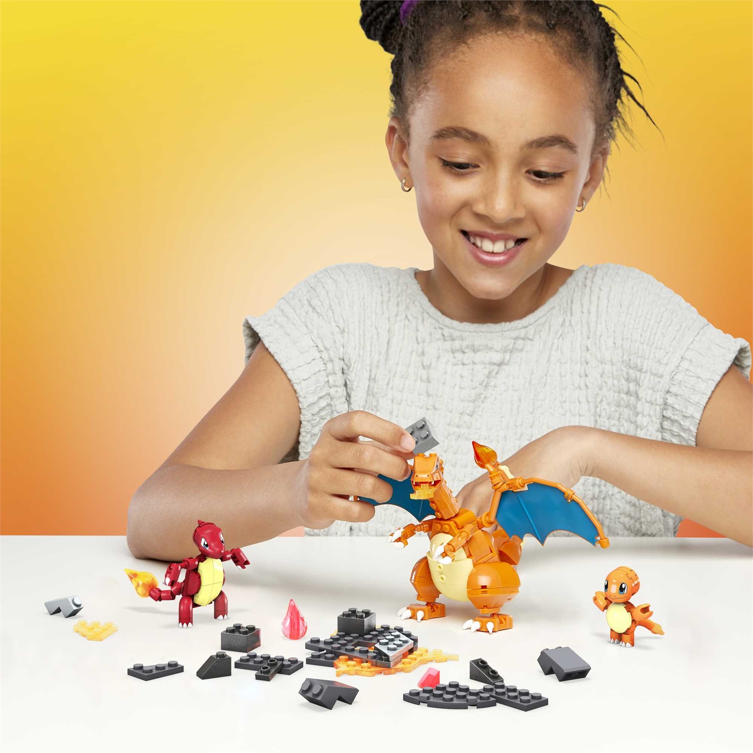 MEGA Construx Pokémon Personaggio Charmander Evolution con 313 Blocchi da Costruzione, Set di Costruzioni con Charmander, Charmeleon e Charizard, Giocattolo per Bambini 7 Anni