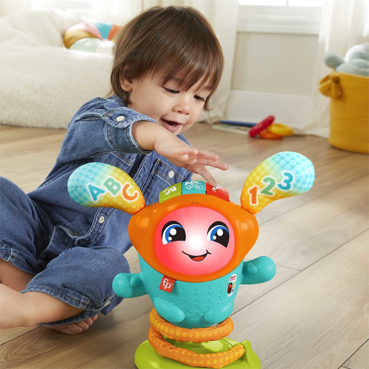Fisher-Price DJ Hüpfi - Giocattolo educativo musicale interattivo con luci e azione saltellante per bambini 9-36 mesi