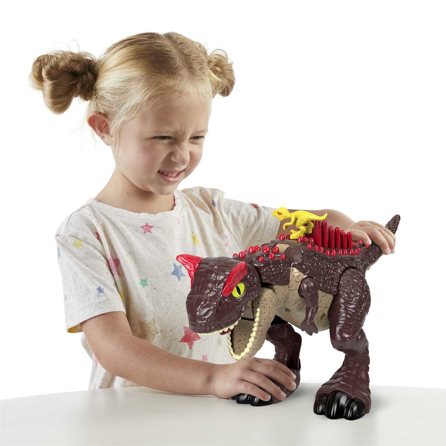 Fisher-Price Imaginext Carnotauro Aculei Pungenti - Dinosauro alto 28 cm con cucciolo di velociraptor e pulsante attivazione fauci, giocattolo per bambini 3 anni