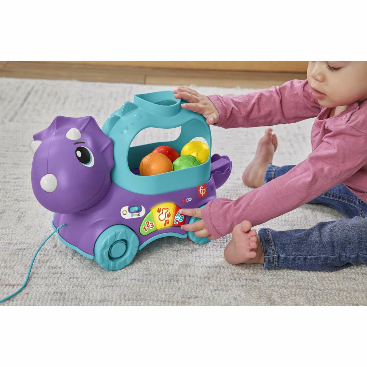 Fisher-Price Dino Impara e Cammina - Dinosauro Giocattolo da Trainare con Palline Saltellanti, Contenuti Multilingue Smart Stages, Interattivo per Bambini 12 - 36 Mesi, HNR52