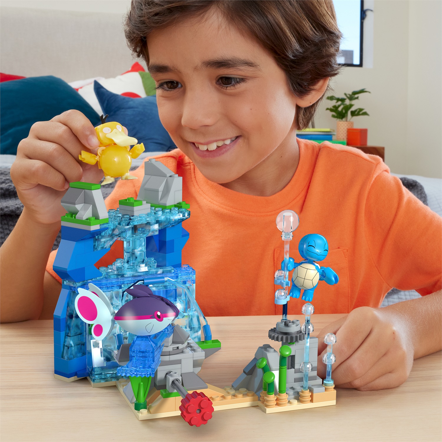 MEGA Pokémon - Avventura Acquatica, set da costruire con 319 pezzi, sistema Mattoncino Movimento e 3 Pokémon snodati inclusi (Squirtle, Psyduck, Finneon), giocattolo per bambini, HXF79