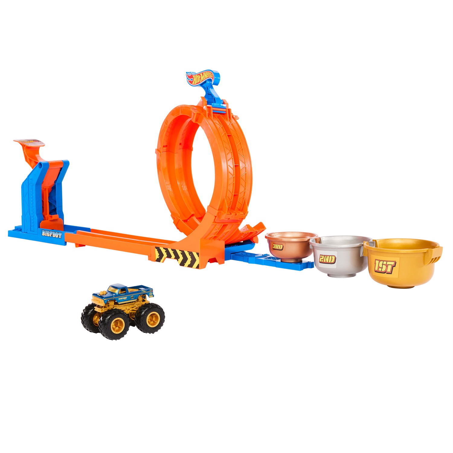 Hot Wheels JBX64 Monster Trucks - Sfida Trofeo Gira e Capovolgi Playset con Truck Bigfoot 50° Anniversario, 2 Modalità di Gioco, Giocattolo per Bambini 4 Anni
