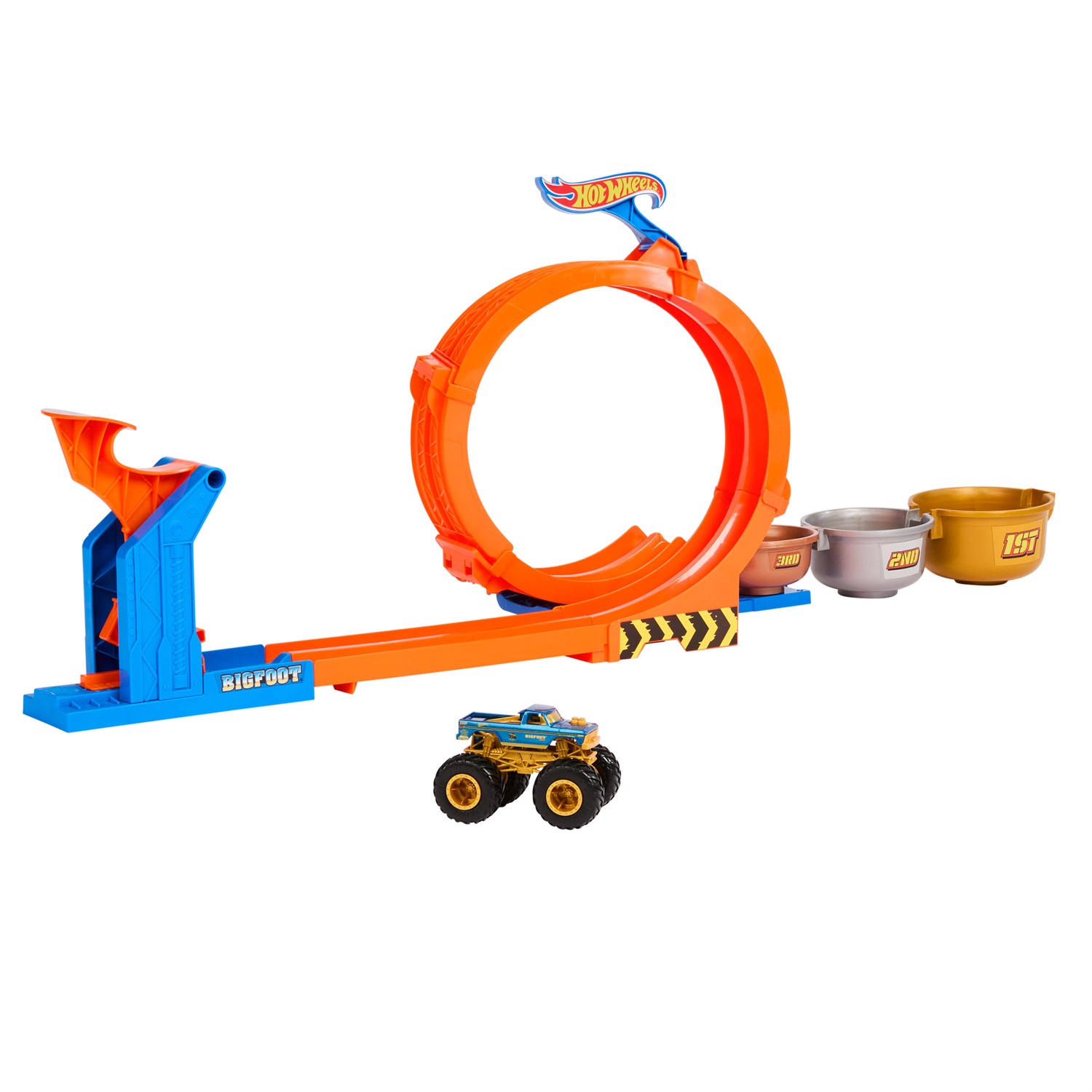 Hot Wheels JBX64 Monster Trucks - Sfida Trofeo Gira e Capovolgi Playset con Truck Bigfoot 50° Anniversario, 2 Modalità di Gioco, Giocattolo per Bambini 4 Anni
