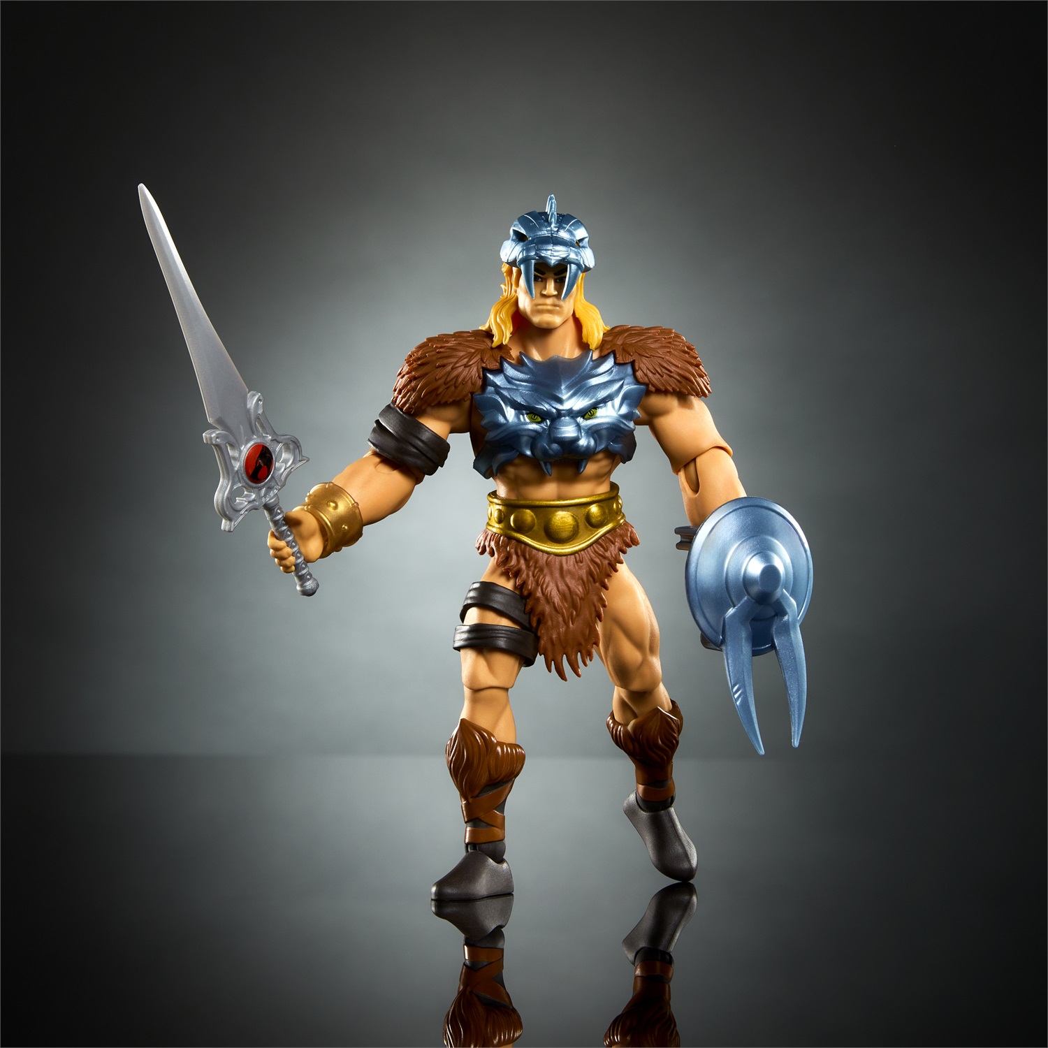 Mattel Masters of the Universe Origins - He-Man Action Figure Snodata Crossover con Armatura Rimovibile, Spada, Scudo e Mini Fumetto, Giocattolo per Bambini 6 Anni