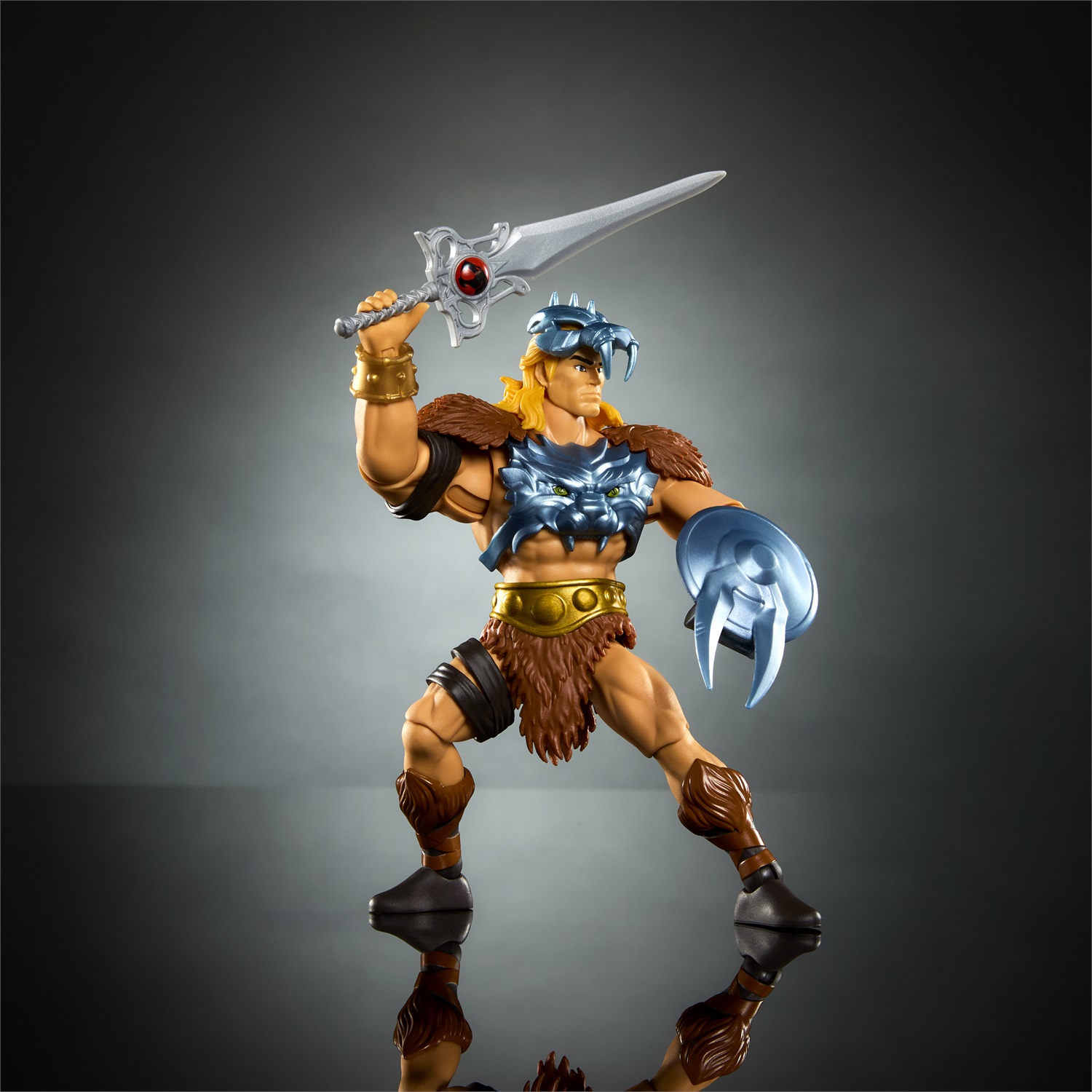 Mattel Masters of the Universe Origins - He-Man Action Figure Snodata Crossover con Armatura Rimovibile, Spada, Scudo e Mini Fumetto, Giocattolo per Bambini 6 Anni
