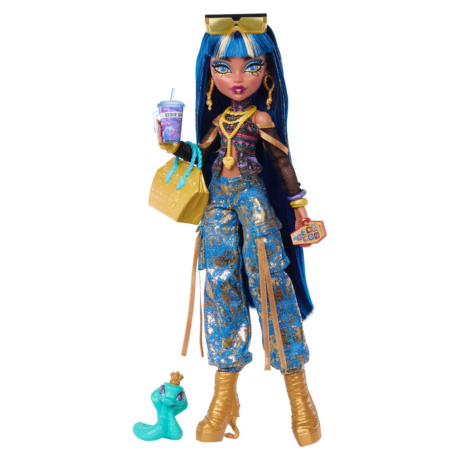 Monster High - Cleo De Nile, bambola con top a fiori, pantaloni cargo in denim dorato e 7 accessori inclusi