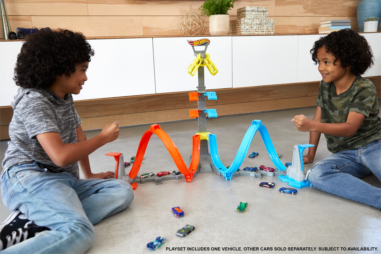 Mattel Hot Wheels GRW39 - Set di pista Loop & Launch con gara verticale e gabbia del vincitore