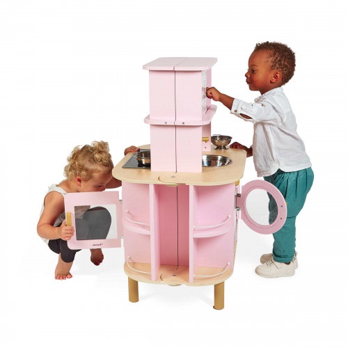 Janod J06616 Cucina in Legno a Due Lati con 8 Accessori Inclusi, Forno, Manopole Girevoli e Piastra Sonora - Colore Pink, dai 3 Anni