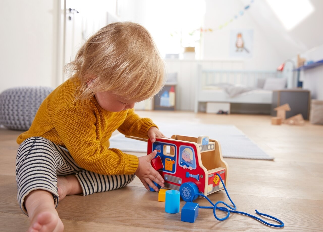 HABA Camion dei Vigili del Fuoco da Trainare - Giocattolo Educativo con Blocchi di Costruzione Colorati