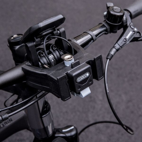 Ortlieb Staffa di Fissaggio Manubrio E-Bike con Lucchetto - Adattatore per Borse e Cestini