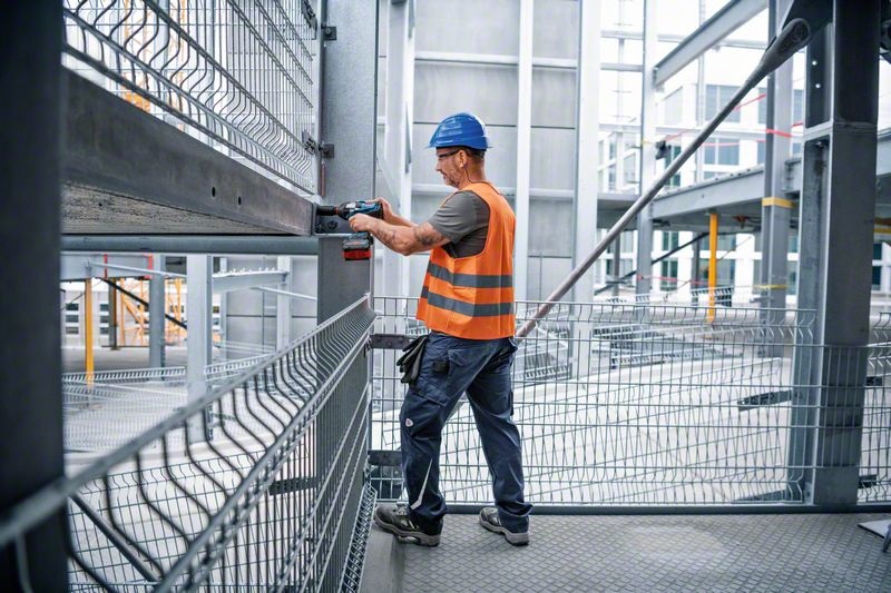 Bosch GDS 18V-1050 H Professional - Avvitatore a Massa Battente a Batteria, Coppia di Serraggio 1.050 Nm, Coppia di Spunto fino a 1.700 Nm, Motore Brushless, 3/4