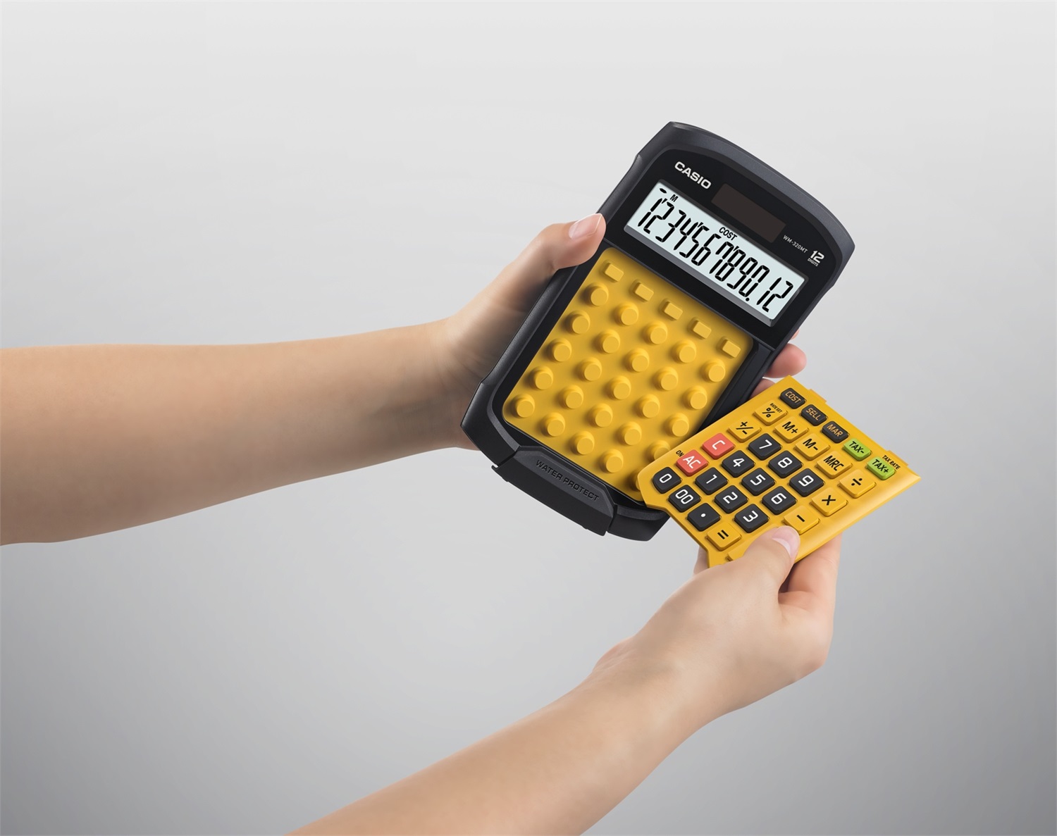 Casio WM-320MT Calcolatrice da Tavolo Waterproof e Dust Proof con Display a 12 Cifre e Tastiera Rimovibile - Giallo/Nero