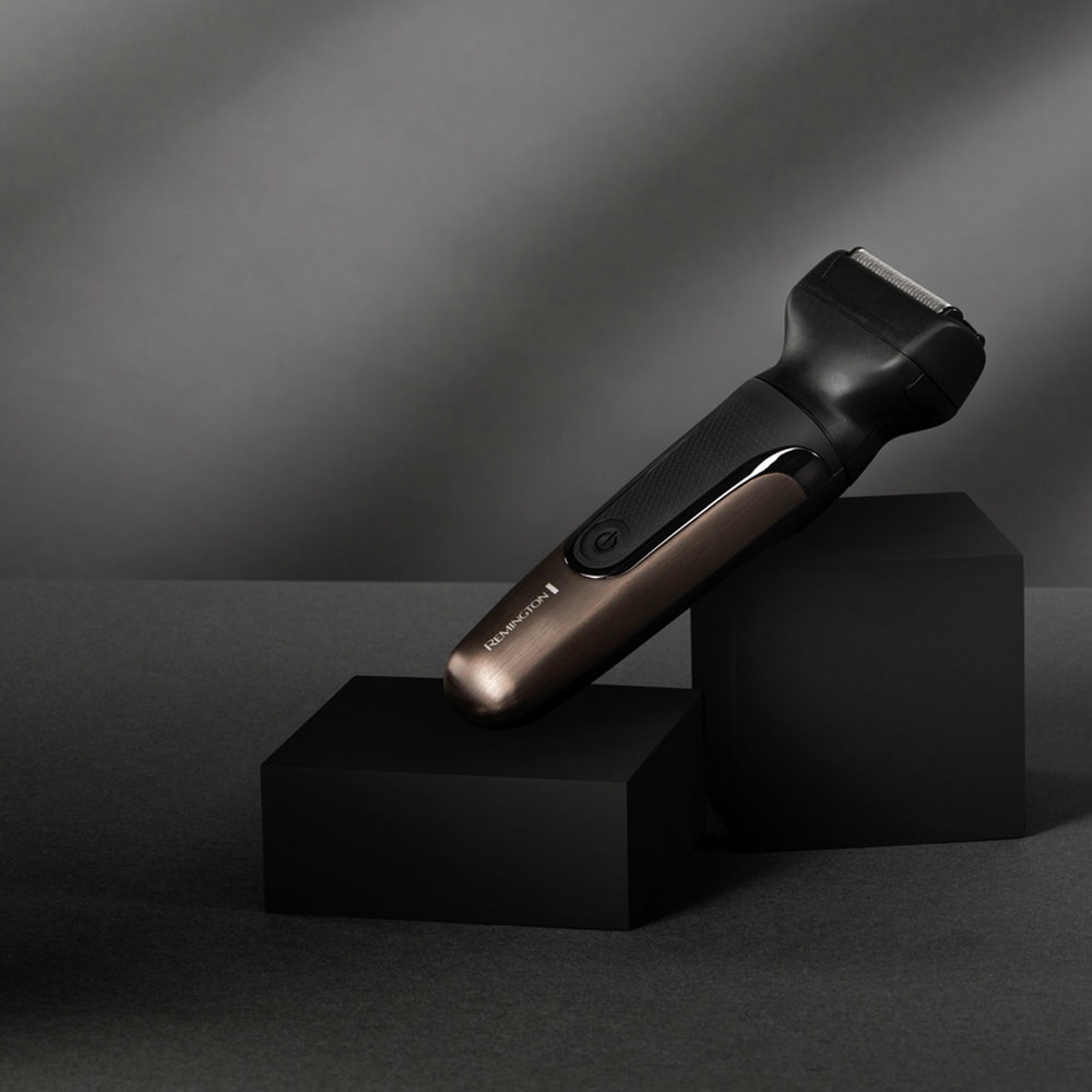 Remington ONE PG780 Rasoio Elettrico Multiuso - Tagliacapelli, Regolabarba, Rifinitore corpo, naso e orecchie - 18 testine/pettini incluse, impermeabile, al litio