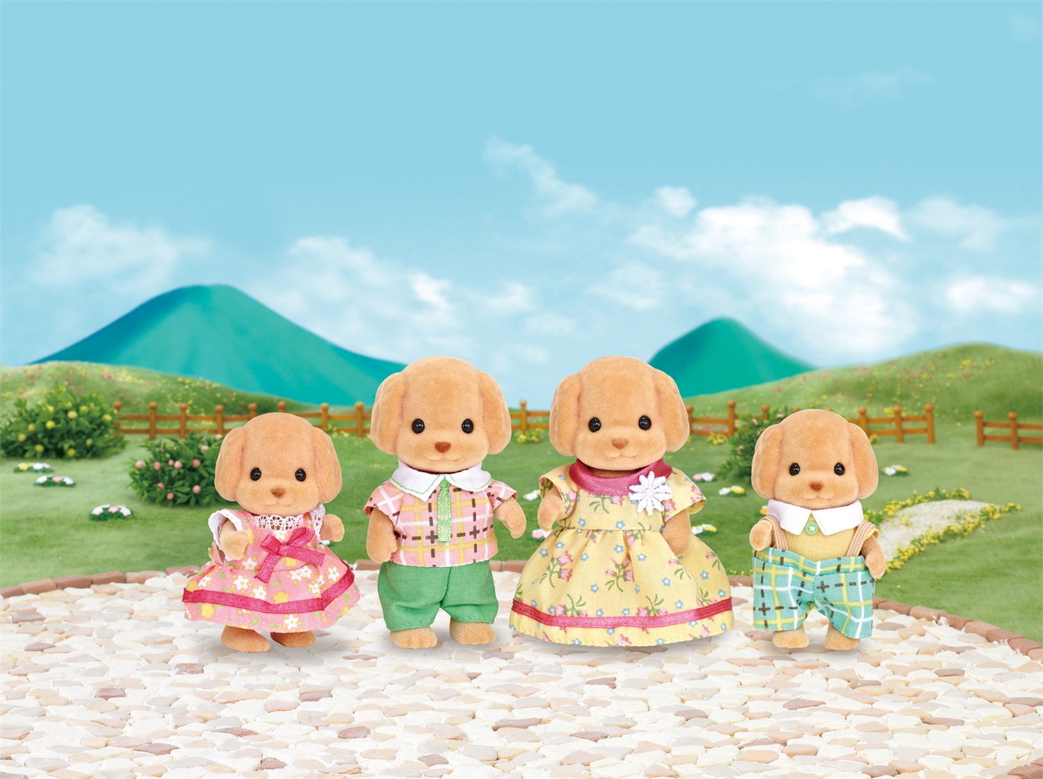Sylvanian Families Famiglia Barboncini - Set di 4 figure con vestiti in tessuto e libro di storie, adatto per bambini dai 3 anni