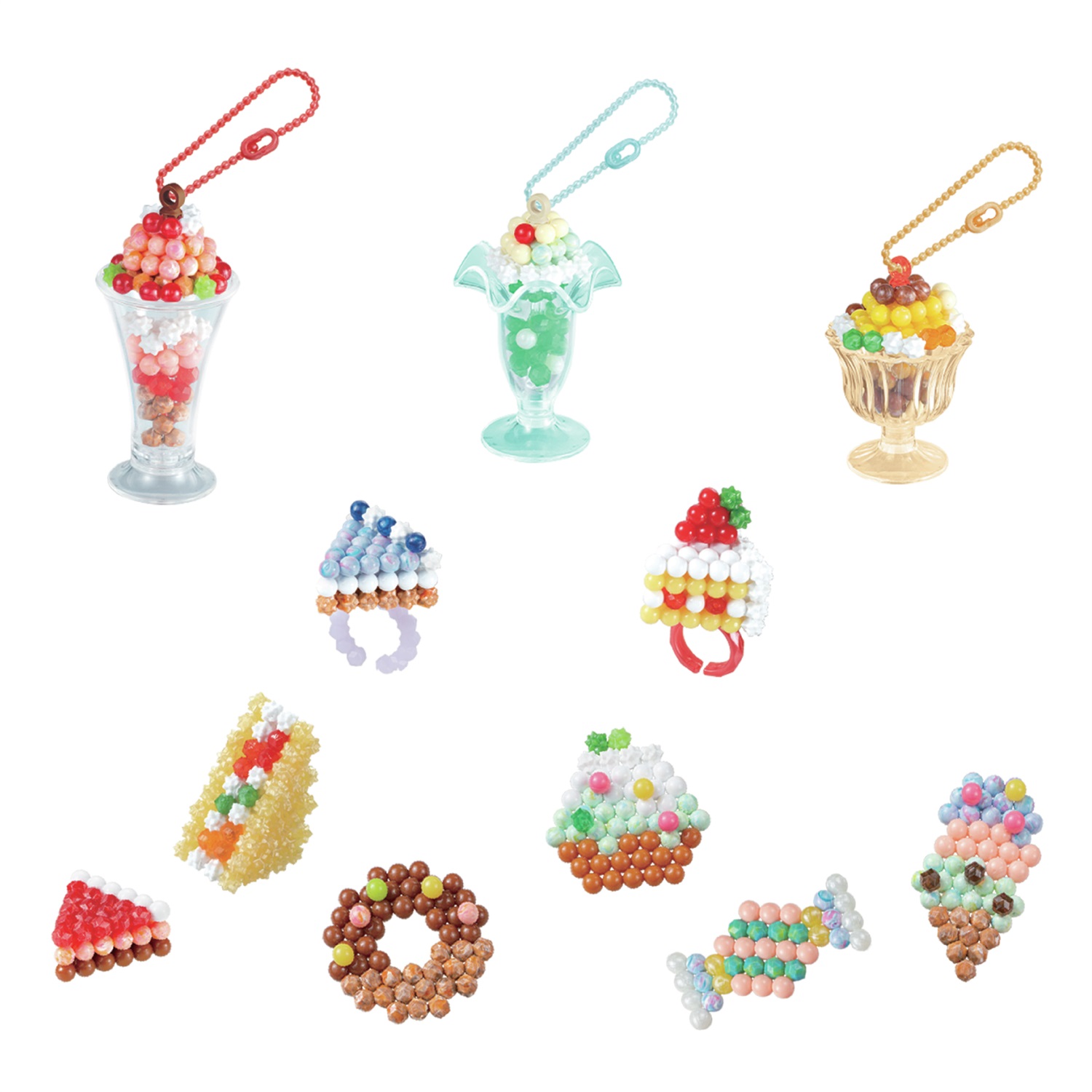 Aquabeads 35090 Kit per Accessori Dolci - 700 Perline in 31 Colori, Vassoio, Spruzzatore e Accessori Inclusi