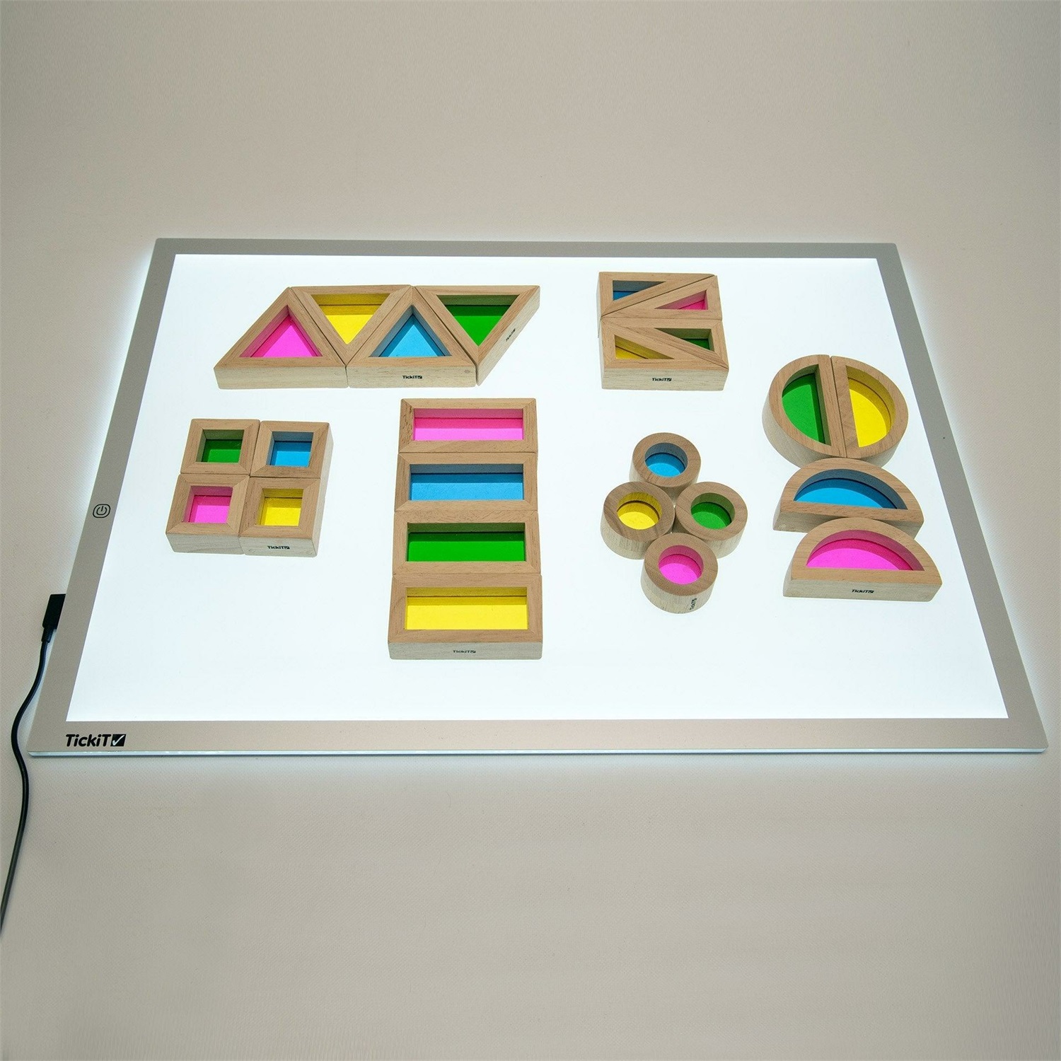 TICKIT Rainbow Block Set - 24 Blocchi di Legno Traslucidi in 6 Forme con Inserimenti Colorati
