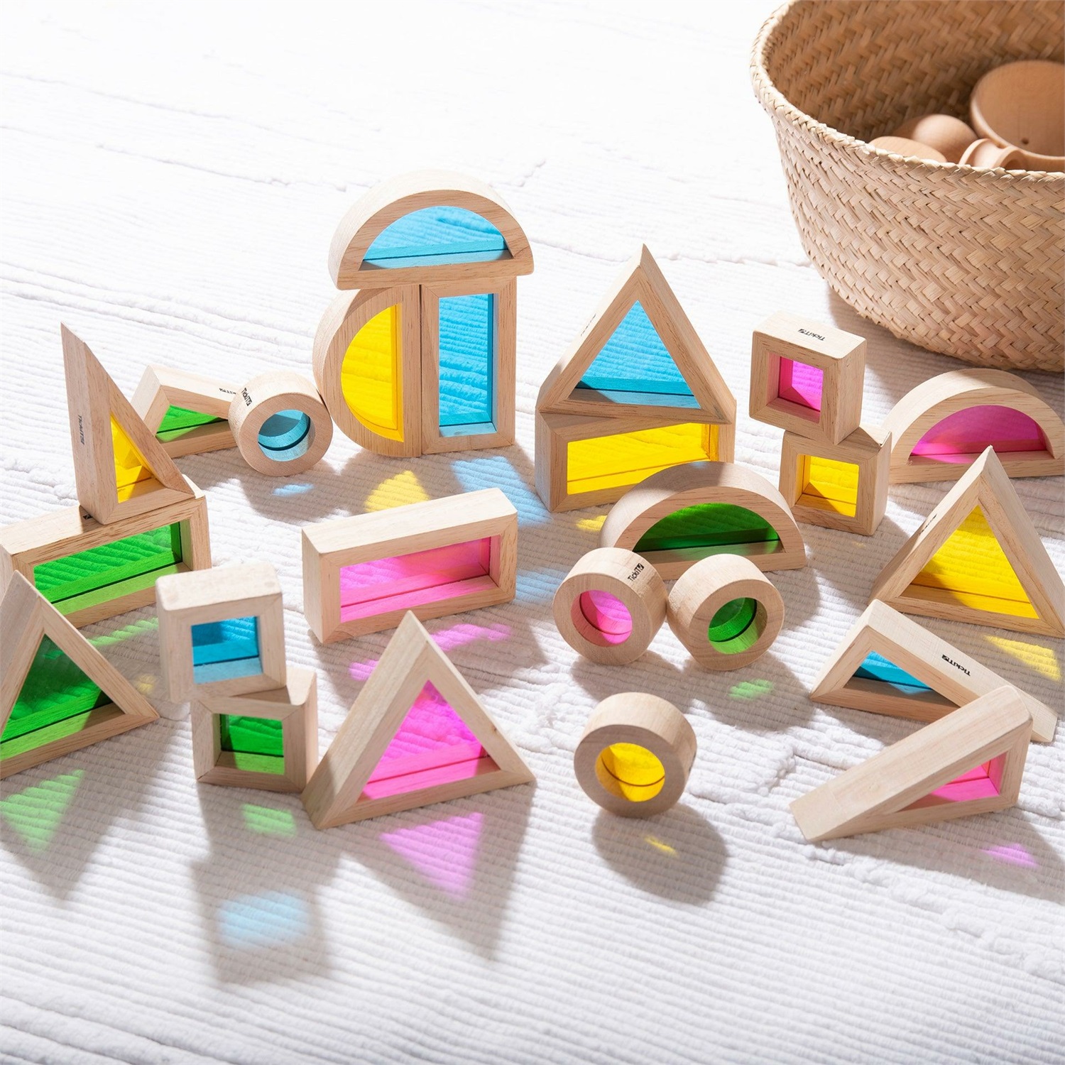 TICKIT Rainbow Block Set - 24 Blocchi di Legno Traslucidi in 6 Forme con Inserimenti Colorati